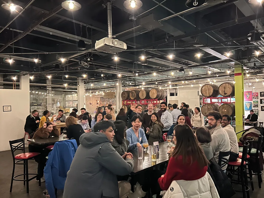 Cambridge Biotech Club members gathering for a networking event
